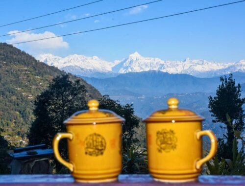Kolakham, a picturesque village in West Bengal, offers majestic Kanchenjunga views, dense forests, waterfalls, and peaceful mountain vibes.